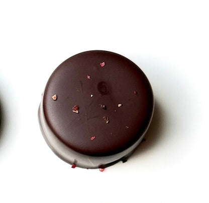 Four different chocolate candies on a white background