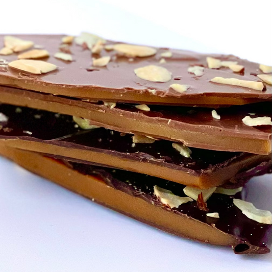Layers of toffee and chocolate with sprinkling of sliced almonds