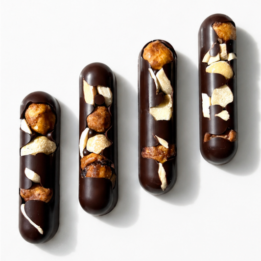 4 dark chocolate oblong bars studded with nuts on a white background