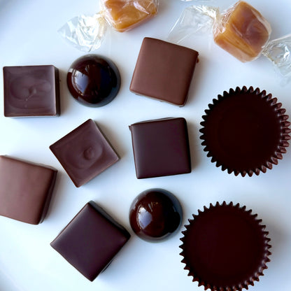 Assorted chocolate candies on a white background