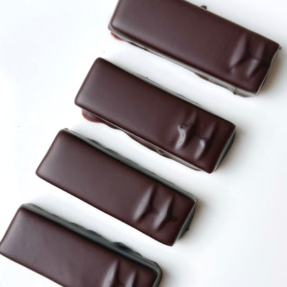 4 chocolate bars on a white background