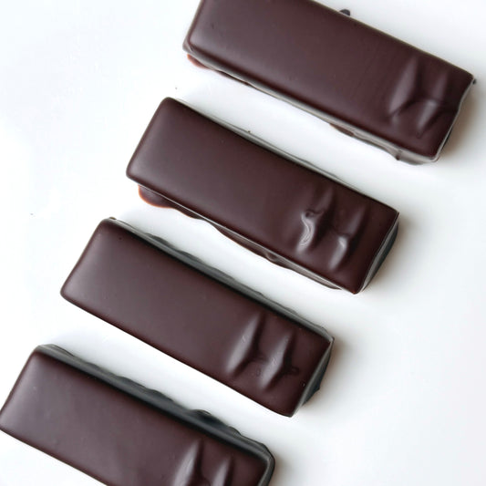 4 chocolate bars on a white background
