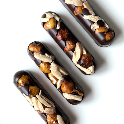 Chocolate bars with nuts on a white background